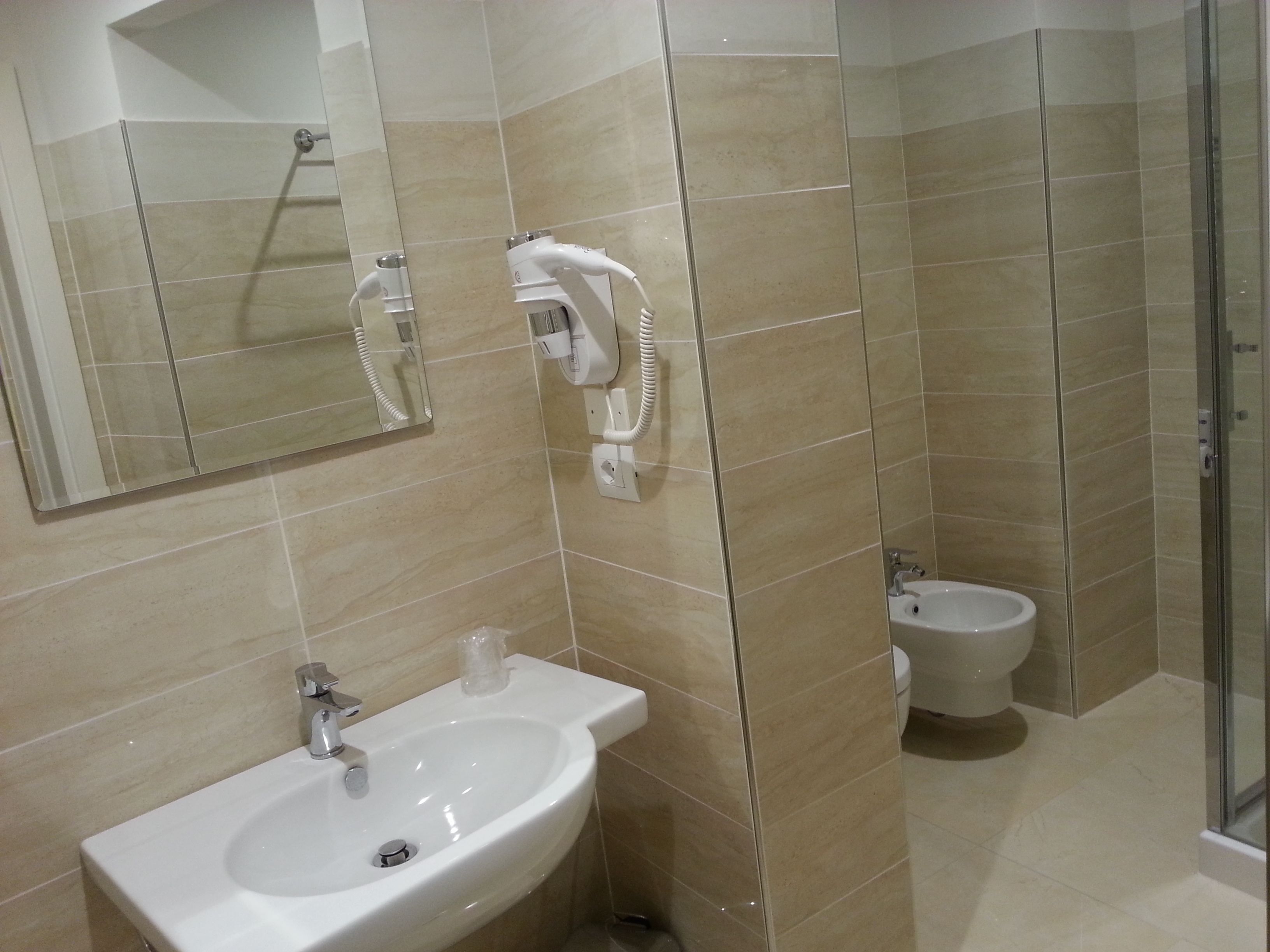 shower, free toiletries, hair dryer, slippers