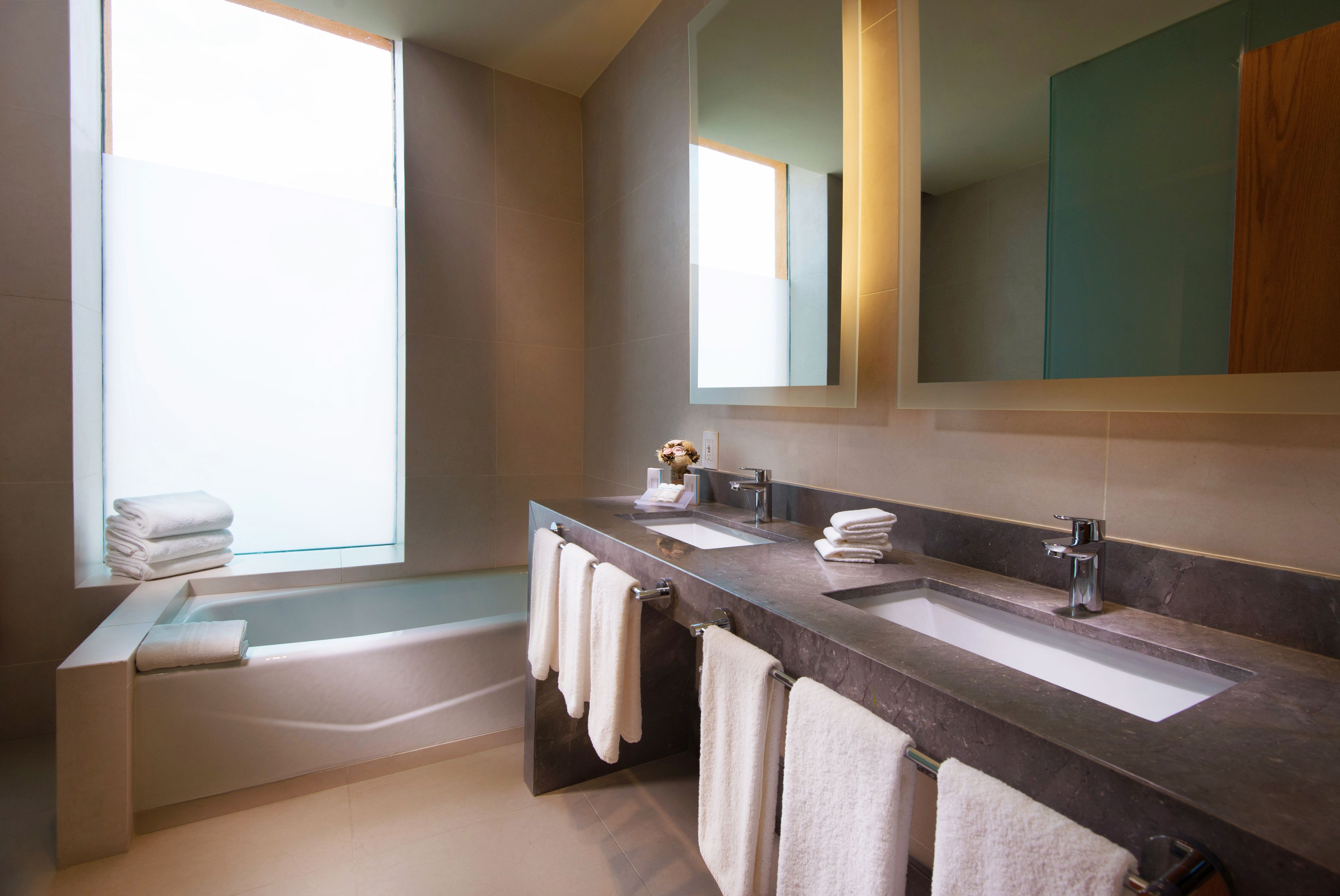 shower, designer toiletries, towels