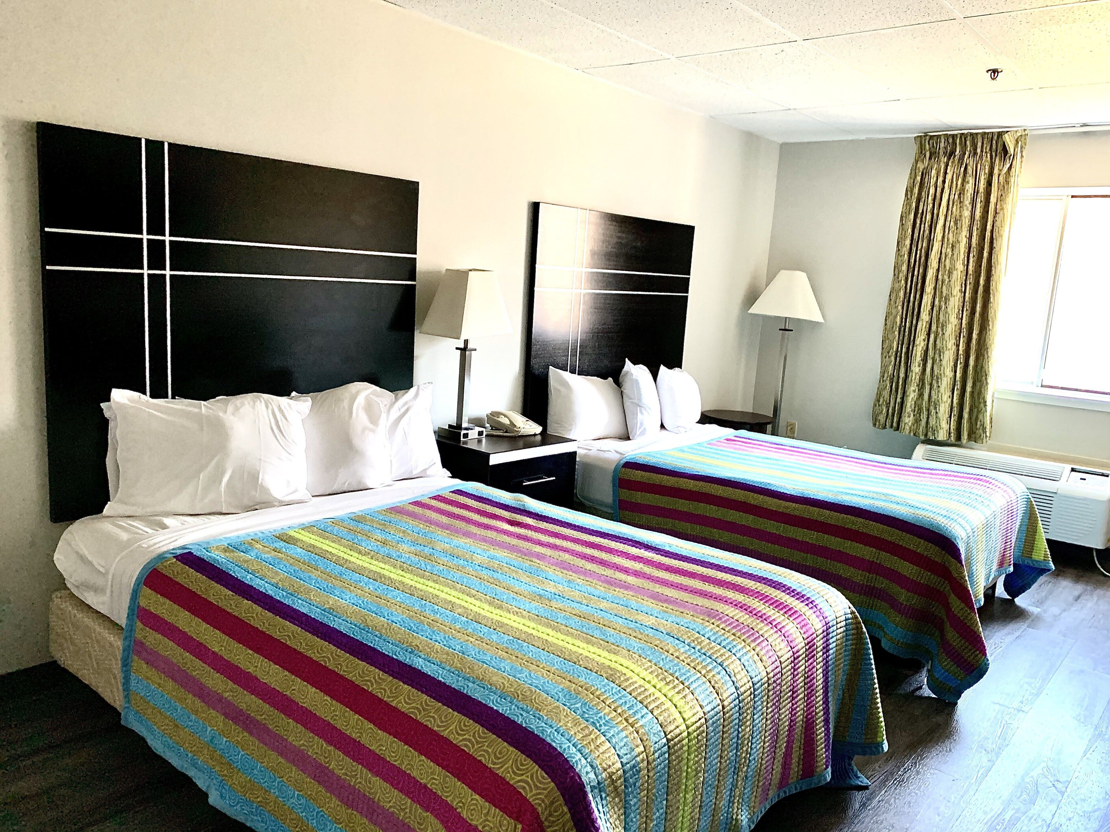 Quarto casal standard de uso individual, 2 camas de casal