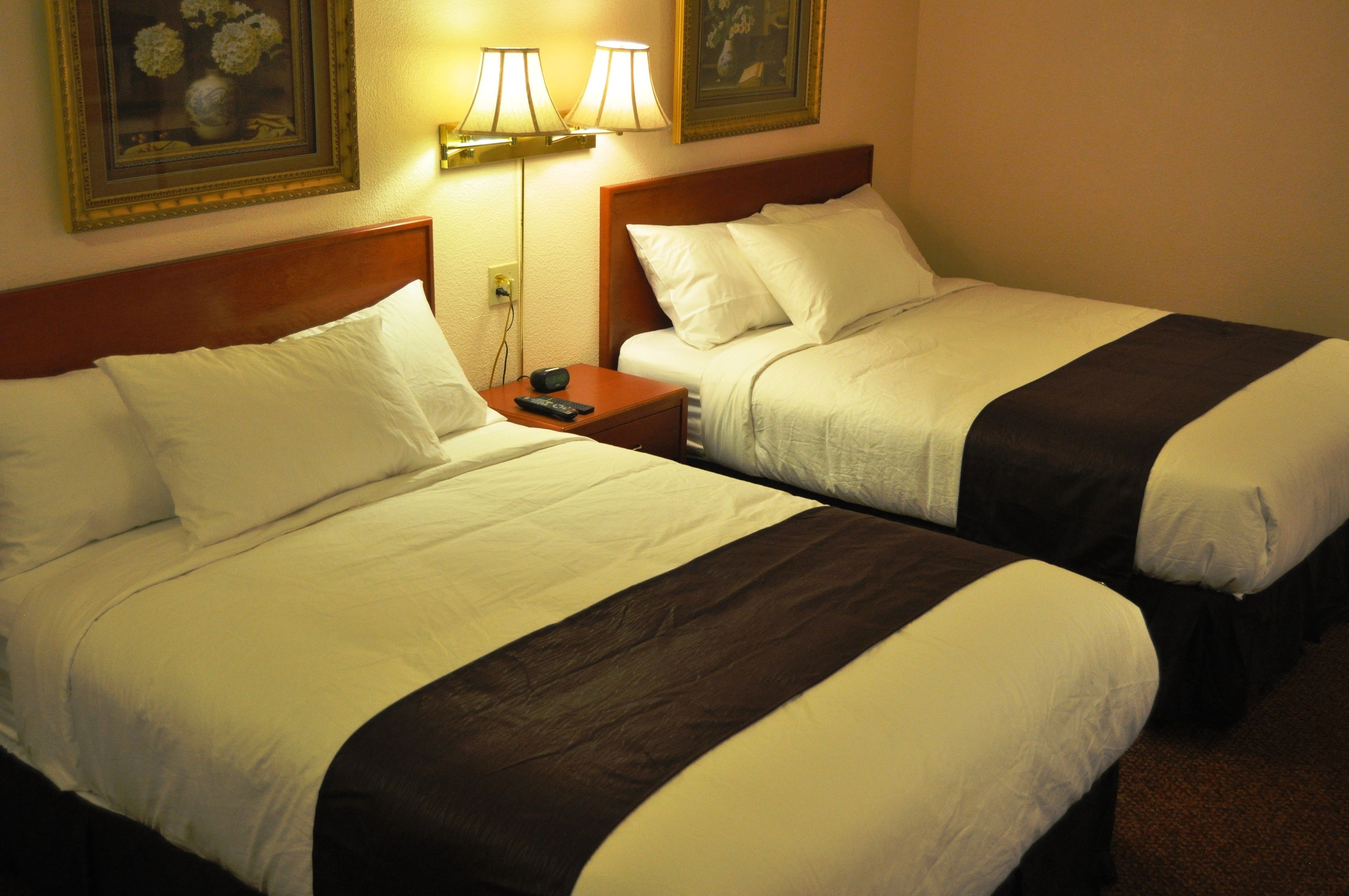 Standard Double Room, 2 Queen Beds | 2 bedrooms, individually furnished, desk, blackout curtains