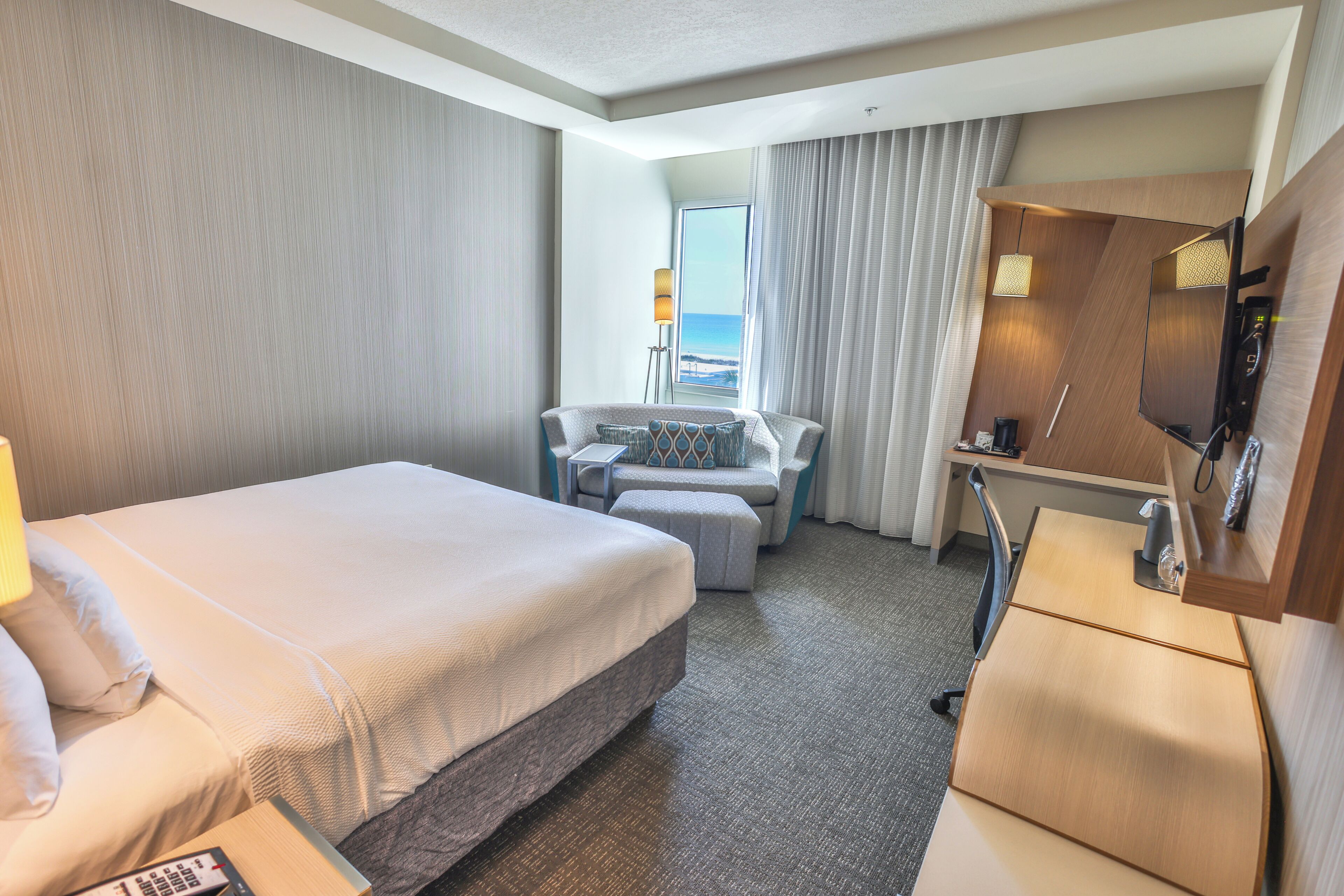 Standard Room, 1 King Bed, Partial Ocean View | Desk, iron/ironing board, free WiFi, bed sheets