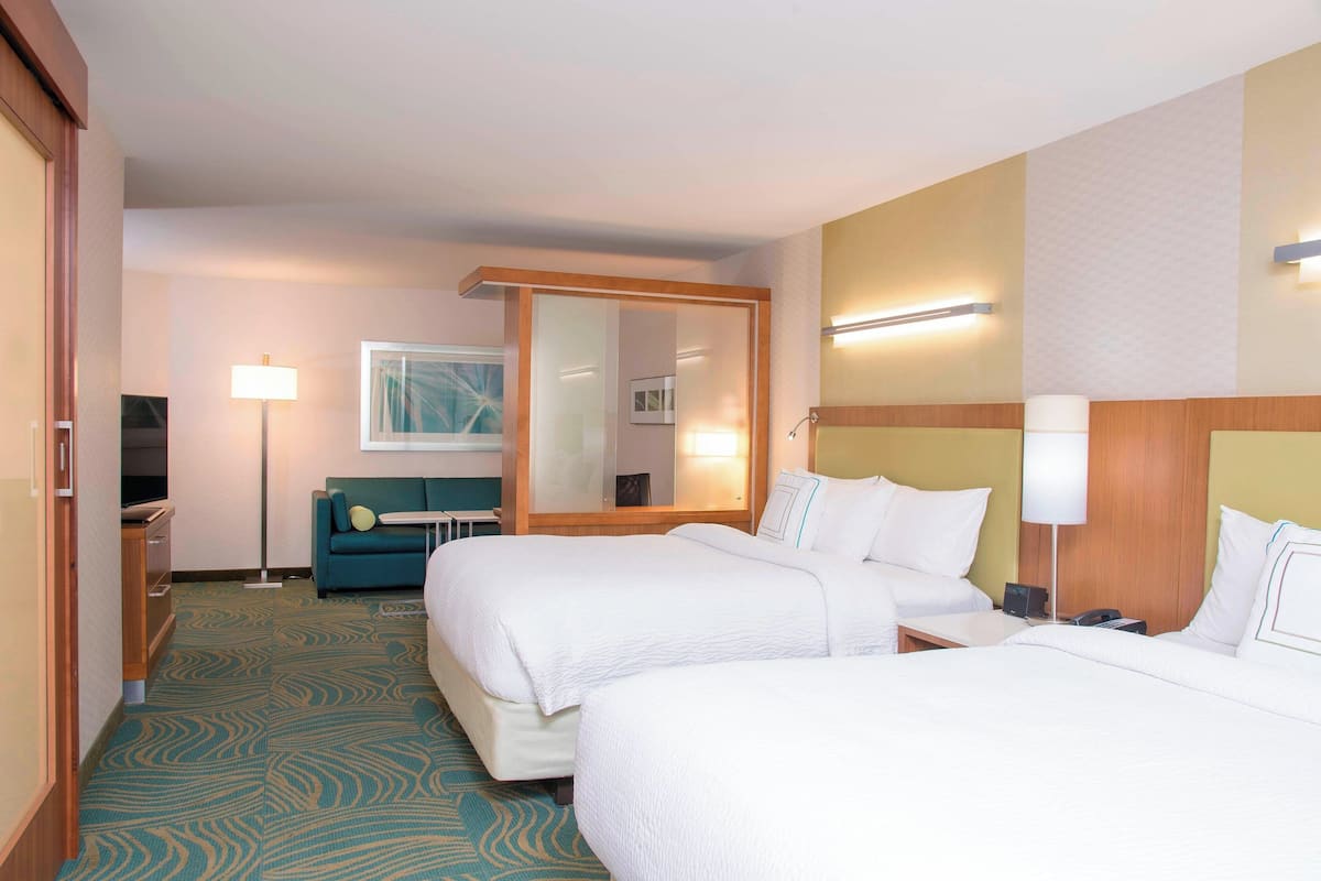 Pillow-top beds, desk, blackout curtains, iron/ironing board