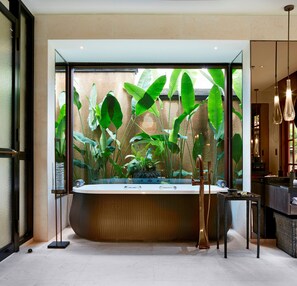 Combined shower/tub, deep soaking tub, hydromassage showerhead - Mandapa, a Ritz-Carlton Reserve (Ubud)