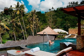 Outdoor pool, free cabanas, pool umbrellas