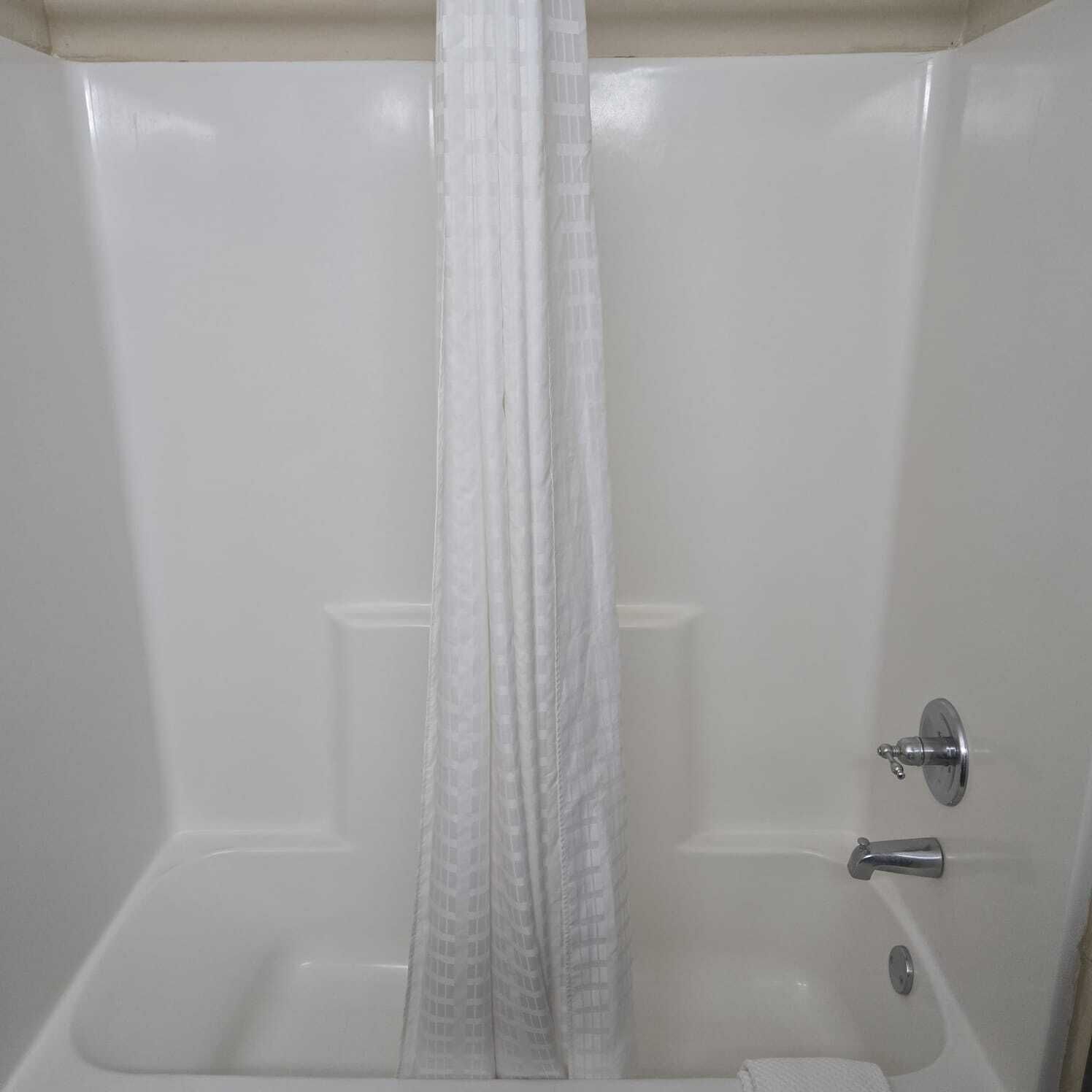 deep-soaking bathtub, free toiletries, hair dryer, towels