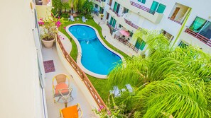 Outdoor pool, pool umbrellas, sun loungers