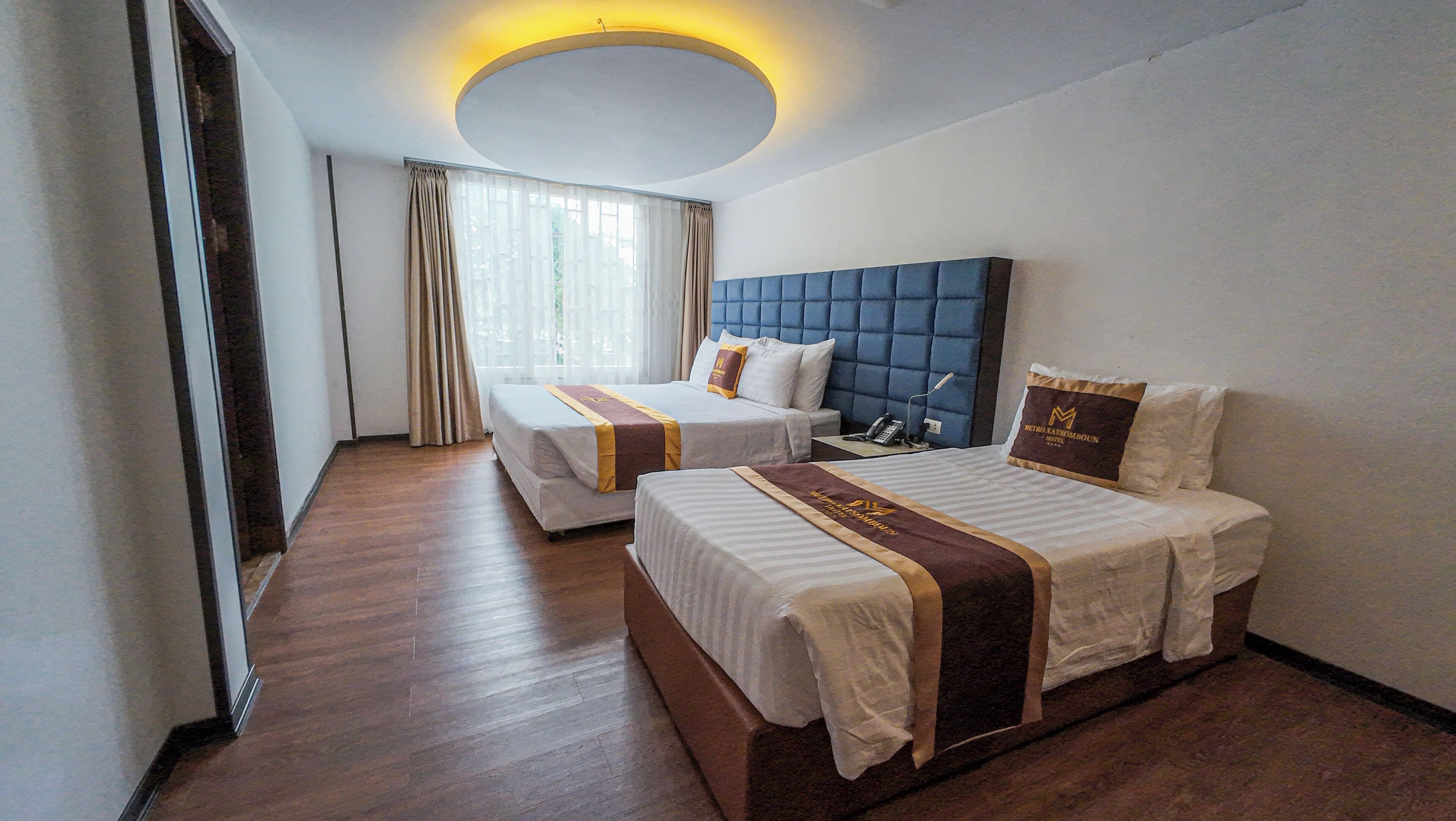 superior family room | minibar, in-room safe, desk, soundproofing