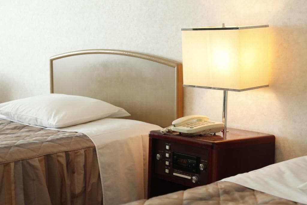 premium bedding, desk, blackout curtains, soundproofing