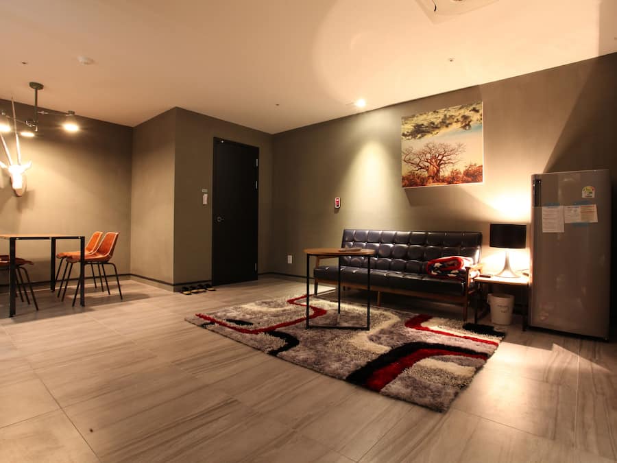 VIP Room | Living area | Flat-screen TV, computer