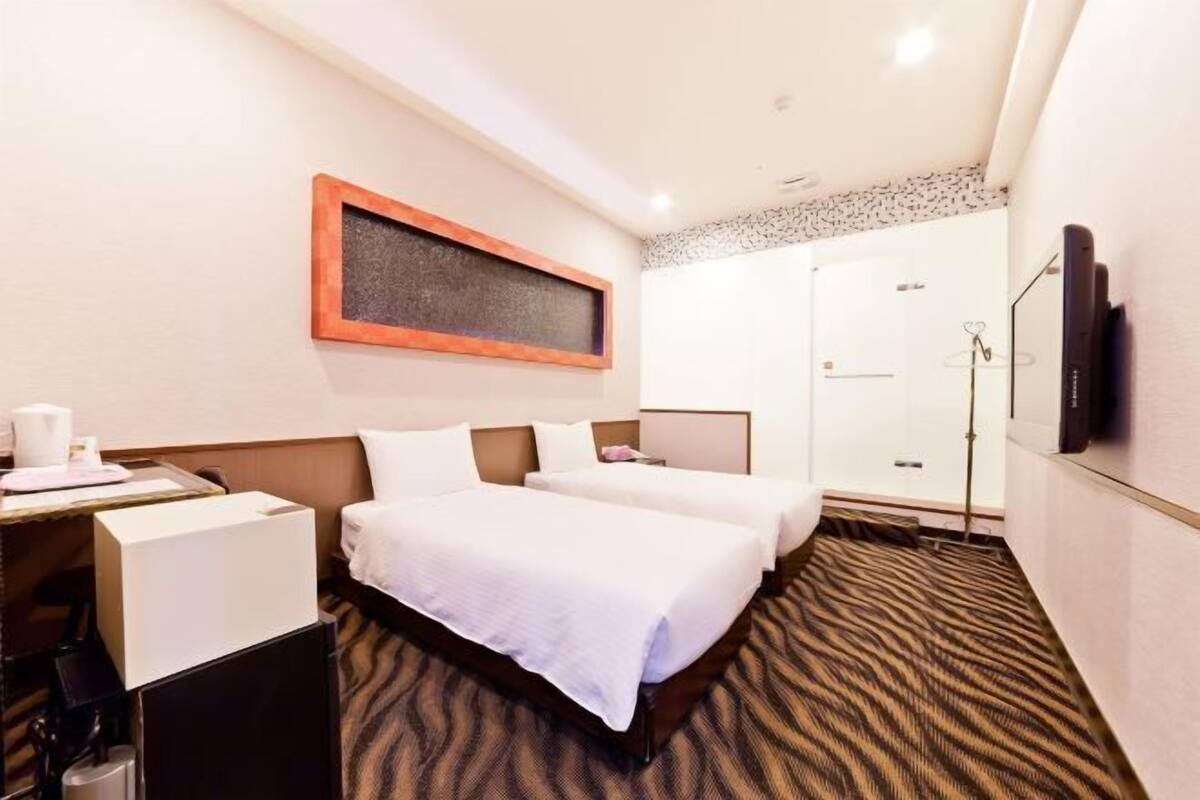 Down duvets, desk, blackout curtains, bed sheets