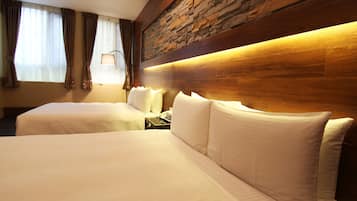 Down duvets, desk, blackout curtains, free cots/infant beds