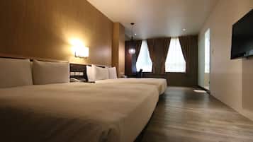 Deluxe Quadruple Room, 2 Double Beds | Down comforters, desk, blackout drapes, bed sheets