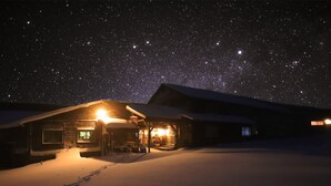 A snow-covered cabin with a starry night sky. - Yachi Onsen Spa (Towada)