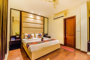 Seprai premium, minibar, dan brankas