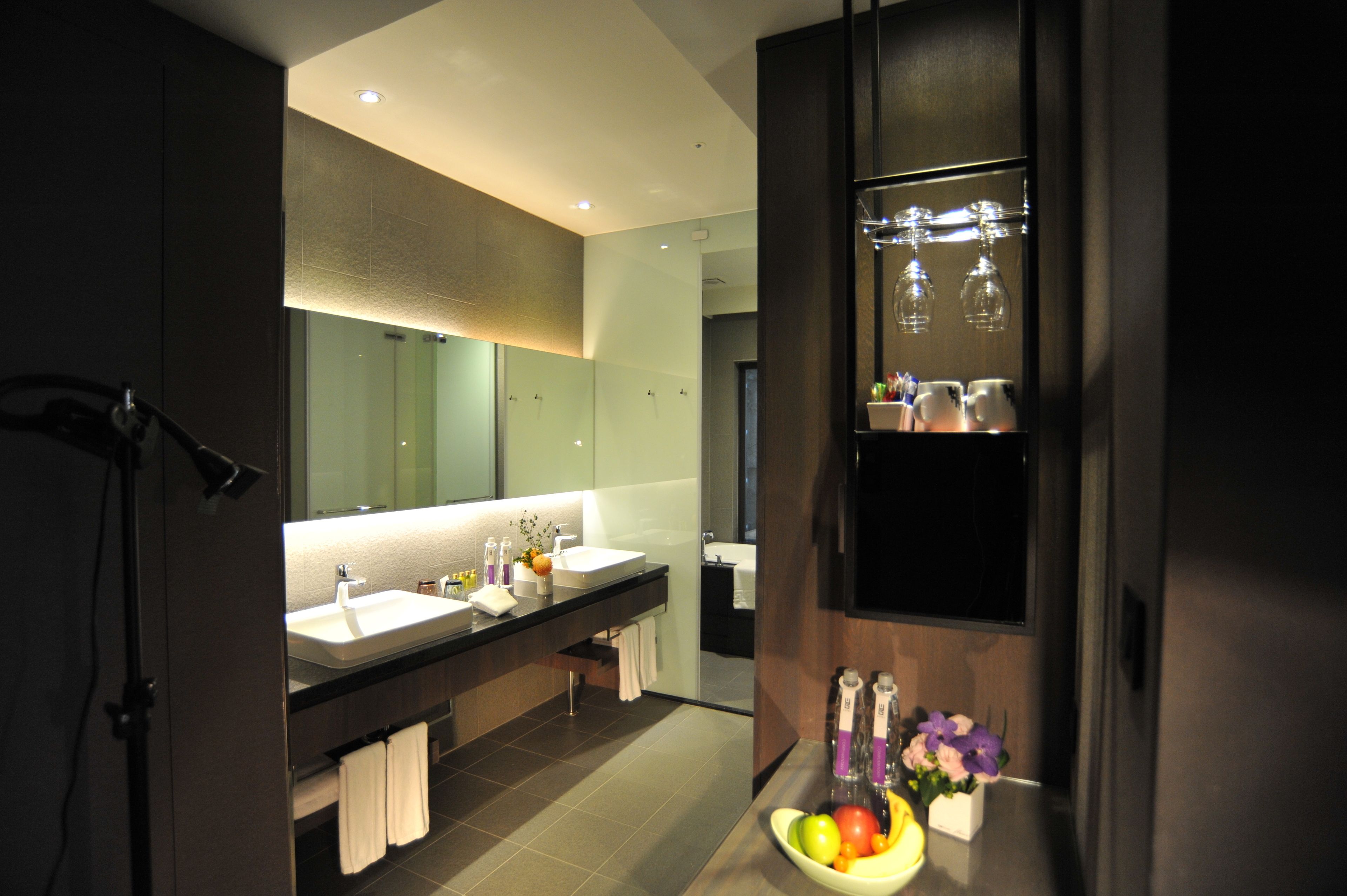 deluxe quadruple room, 2 double beds | bathroom | shower, rainfall showerhead, hair dryer, bathrobes