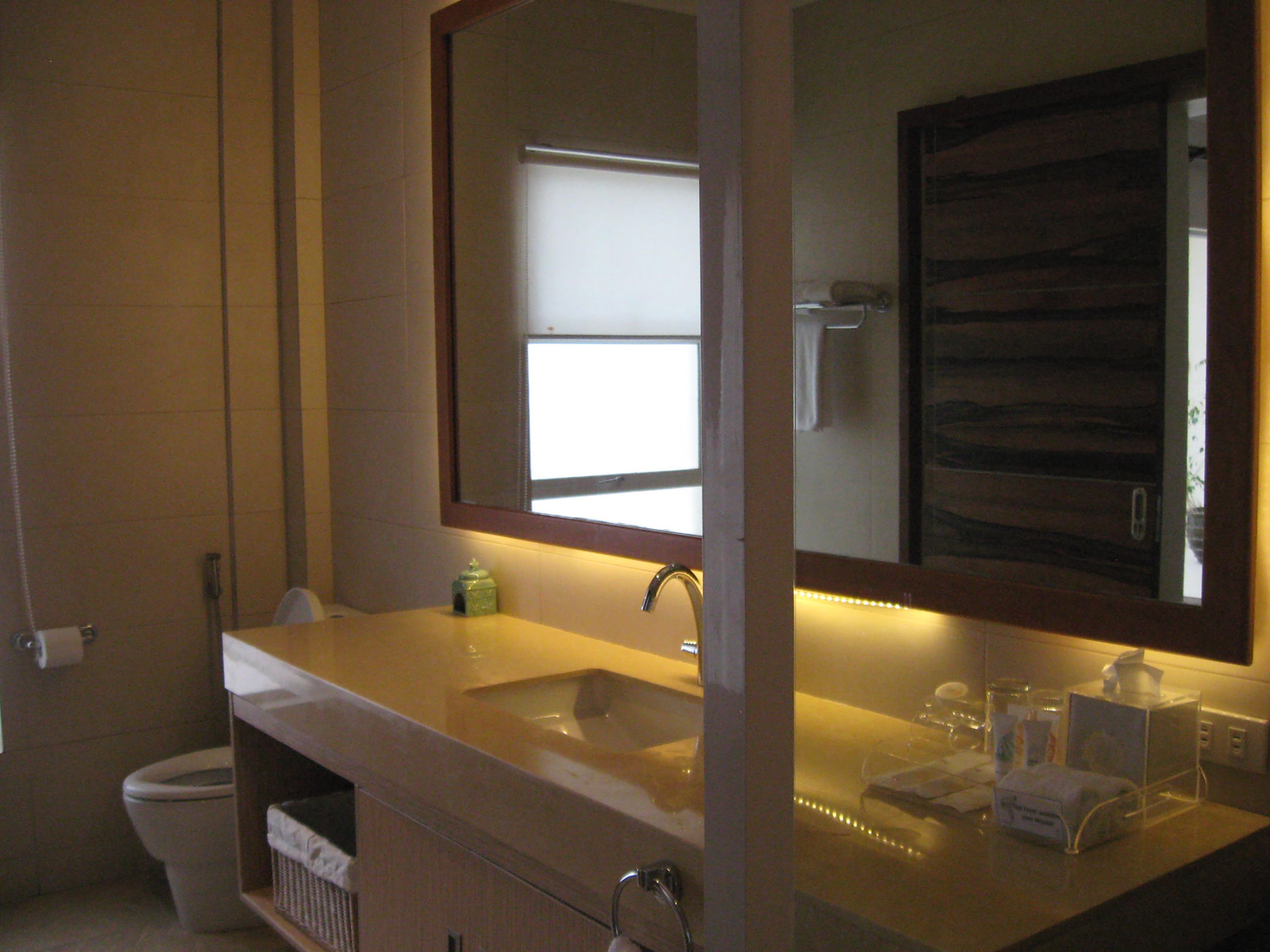 ocean room with 1 king bed | bathroom | shower, rainfall showerhead, designer toiletries, hair dryer