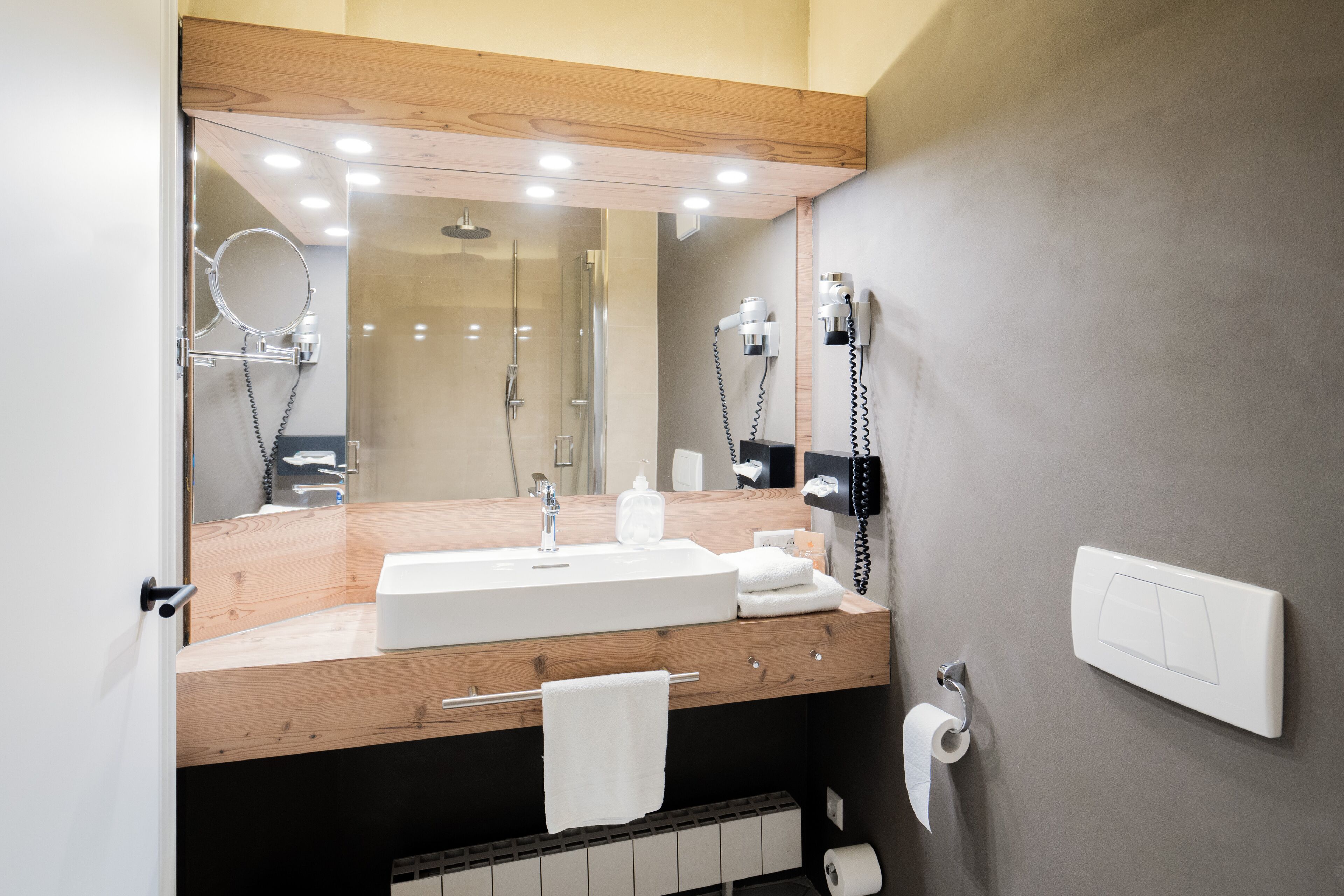 shower, eco-friendly toiletries, hair dryer, bathrobes