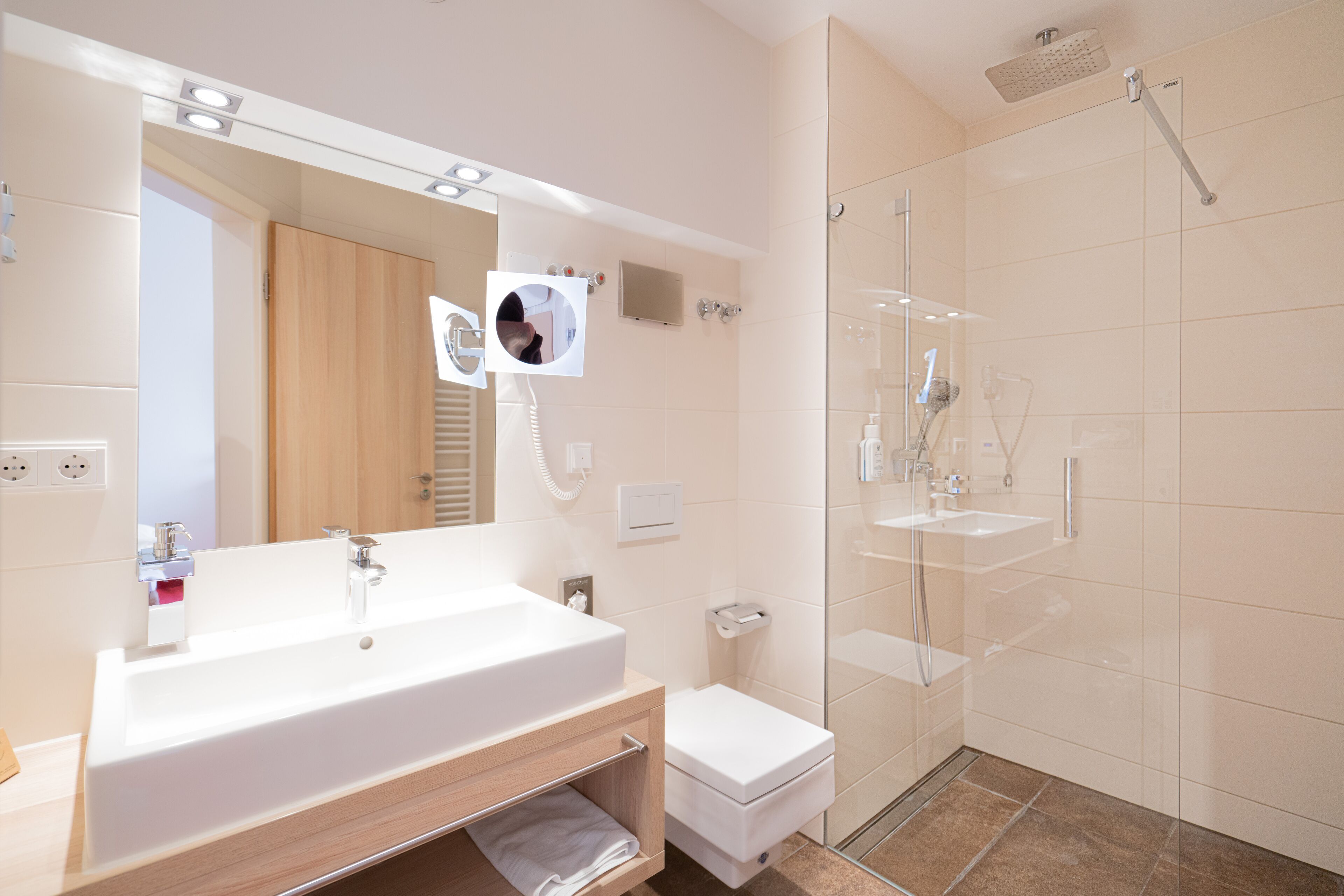 shower, eco-friendly toiletries, hair dryer, bathrobes