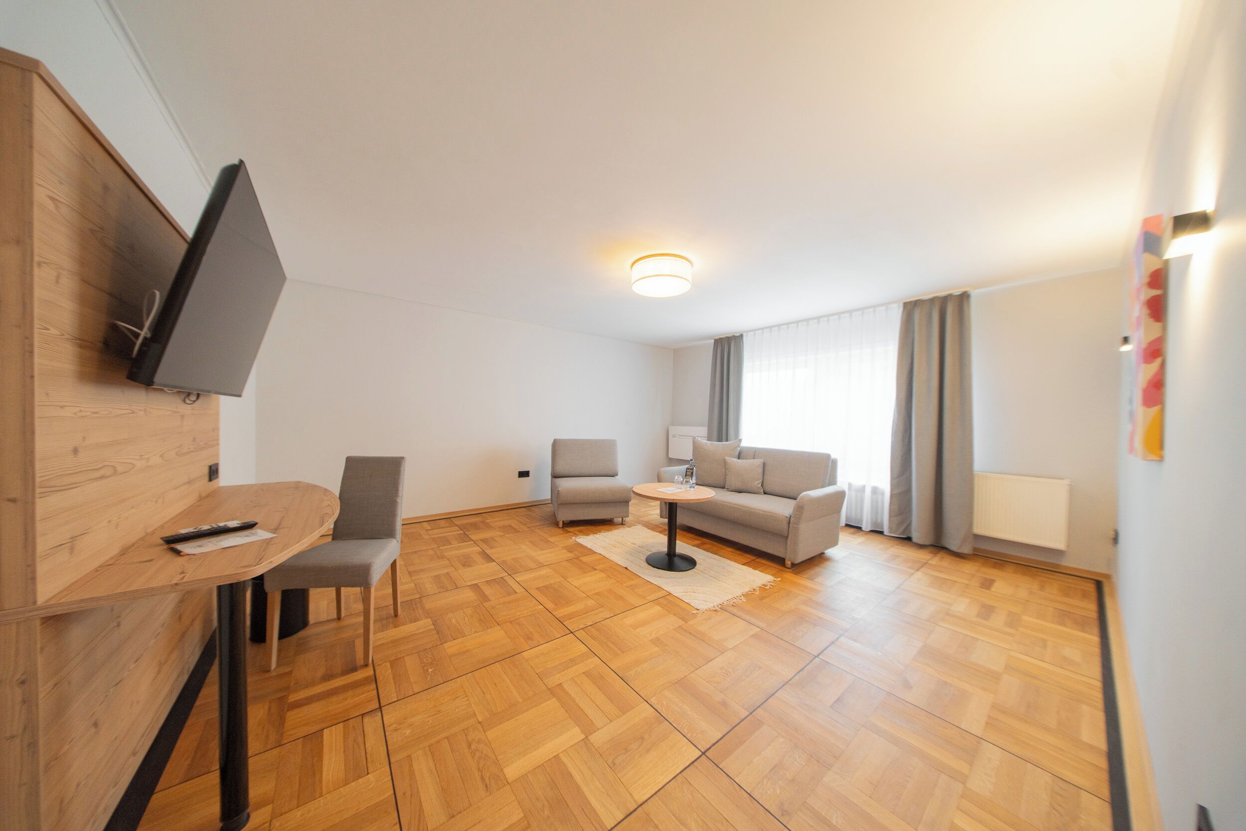 Family Apartment | Living area | 55-inch flat-screen TV with cable channels, TV, offices