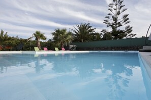 Outdoor pool, pool umbrellas, pool loungers