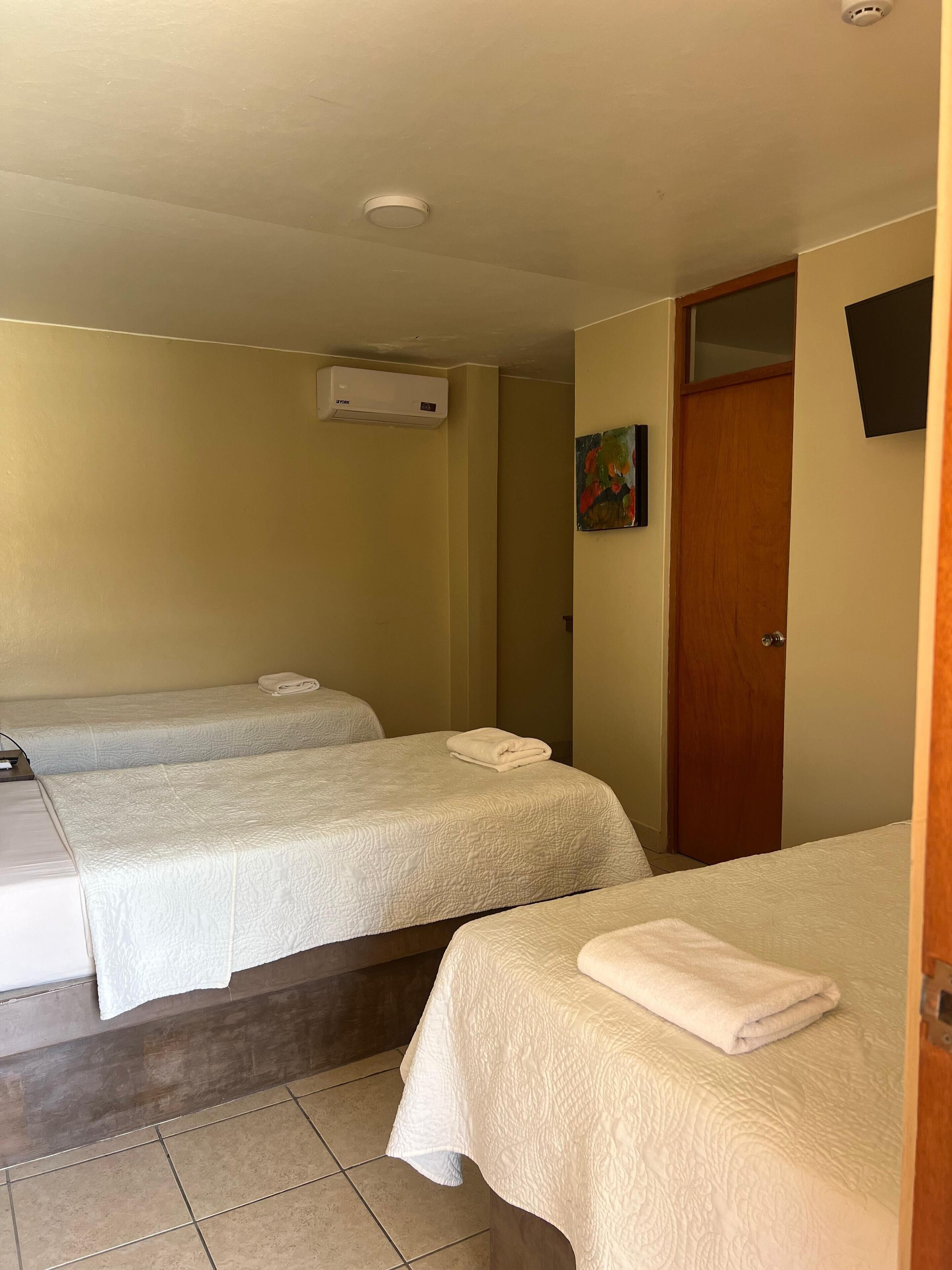 superior triple room | in-room safe, free wifi, bed sheets