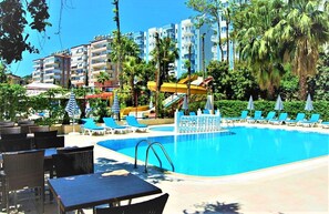 Seasonal outdoor pool, open 9 AM to 7 PM, pool umbrellas, sun loungers