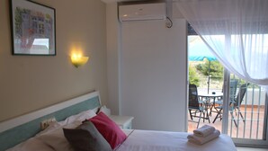 Habitación triple, terraza, vistas al mar