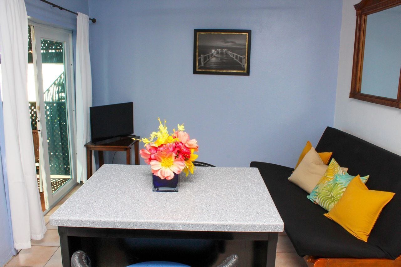 suite, 1 bedroom, balcony, ocean view | living area | tv