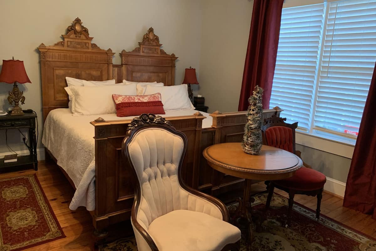 1900’s Crimson Suite | Premium bedding, in-room safe, individually decorated