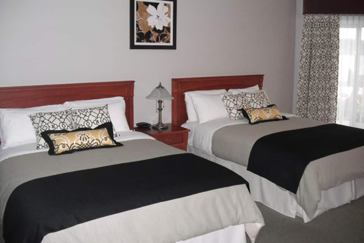 Superior kamer, 2 queensize bedden | Luxe beddengoed, een kluis op de kamer, een bureau, geluiddichte muren