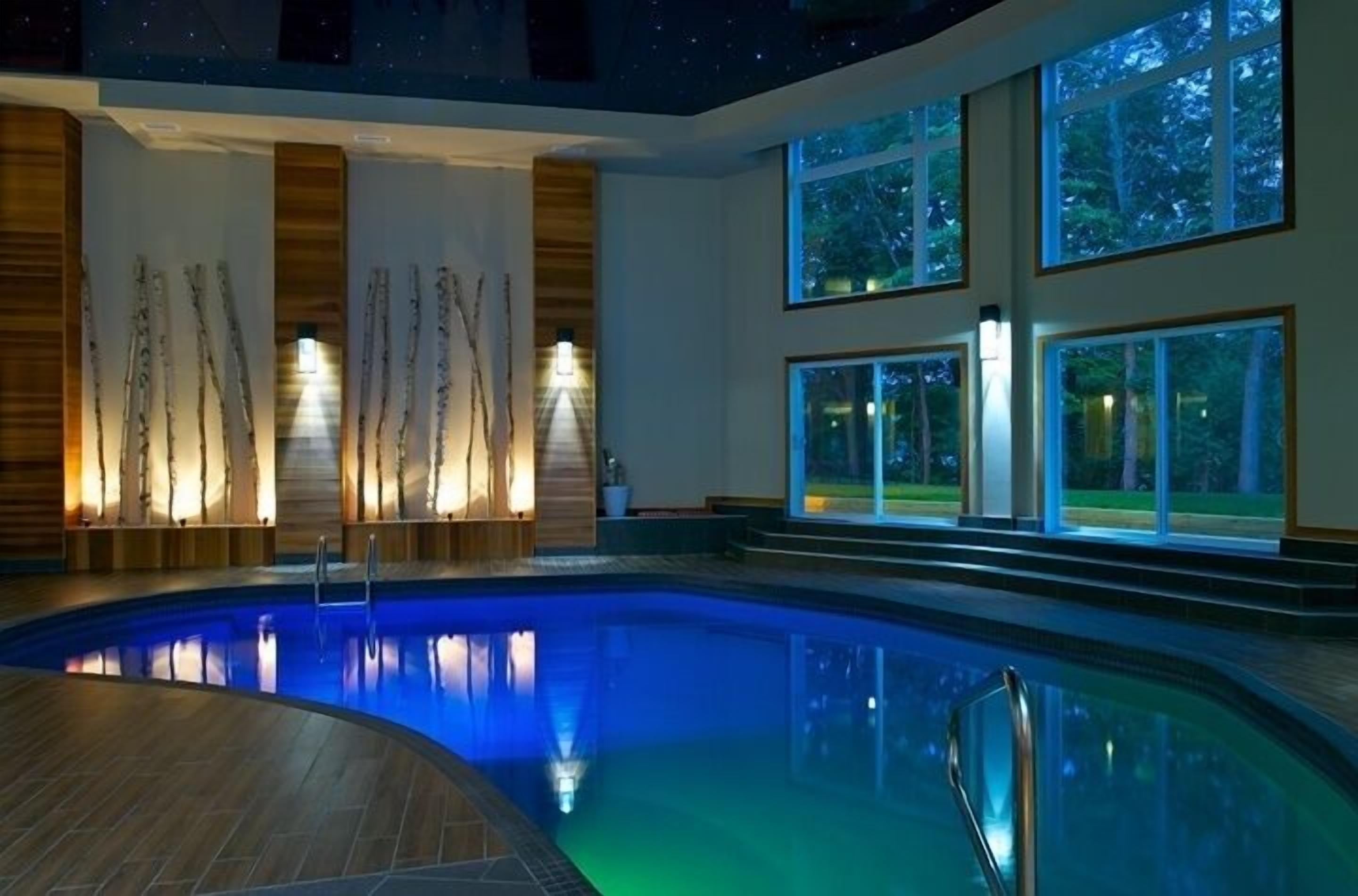 indoor pool, outdoor pool, pool loungers