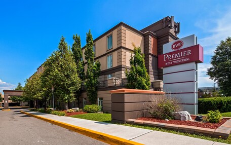A hotel with a prominent sign reading "Premier Best Western."