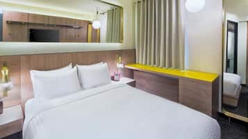 Egyptian cotton sheets, premium bedding, down comforters, in-room safe