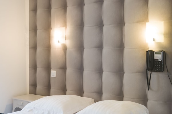 Desk, iron/ironing board, free WiFi, bed sheets
