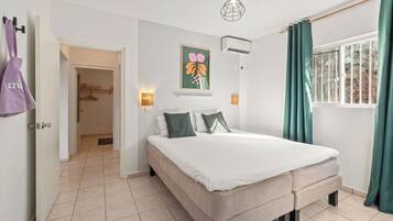 Comfort Apartment, 2 Bedrooms, Garden View | 2 bedrooms, premium bedding, iron/ironing board, cribs/infant beds