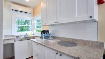 Family Cottage, 2 Bedrooms, Garden View | Private kitchen | Full-sized fridge, microwave, stovetop, coffee/tea maker