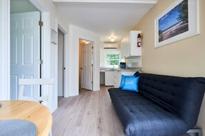 Family Cottage, 2 Bedrooms, Garden View | Living room | TV - Hollywood Cottages (Wasaga Beach)