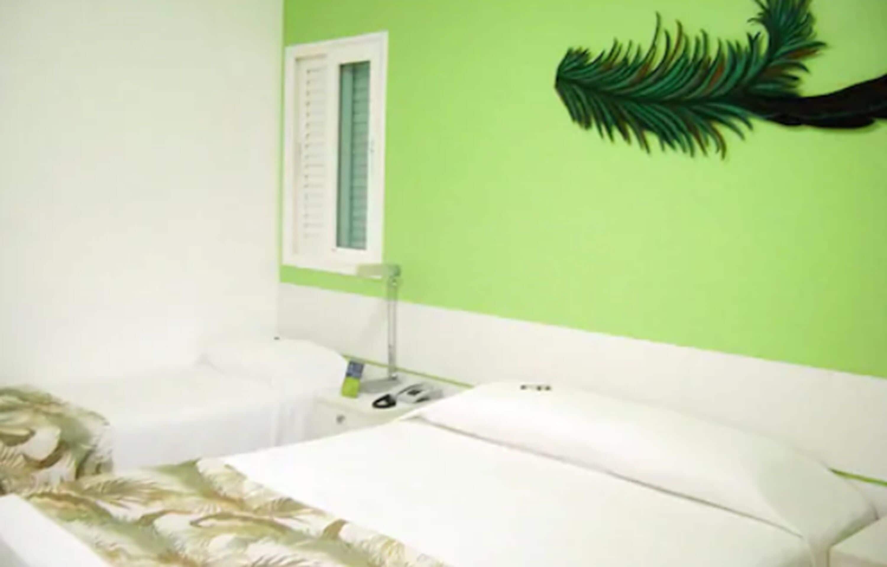 standard triple room | 1 bedroom, in-room safe, desk, blackout curtains