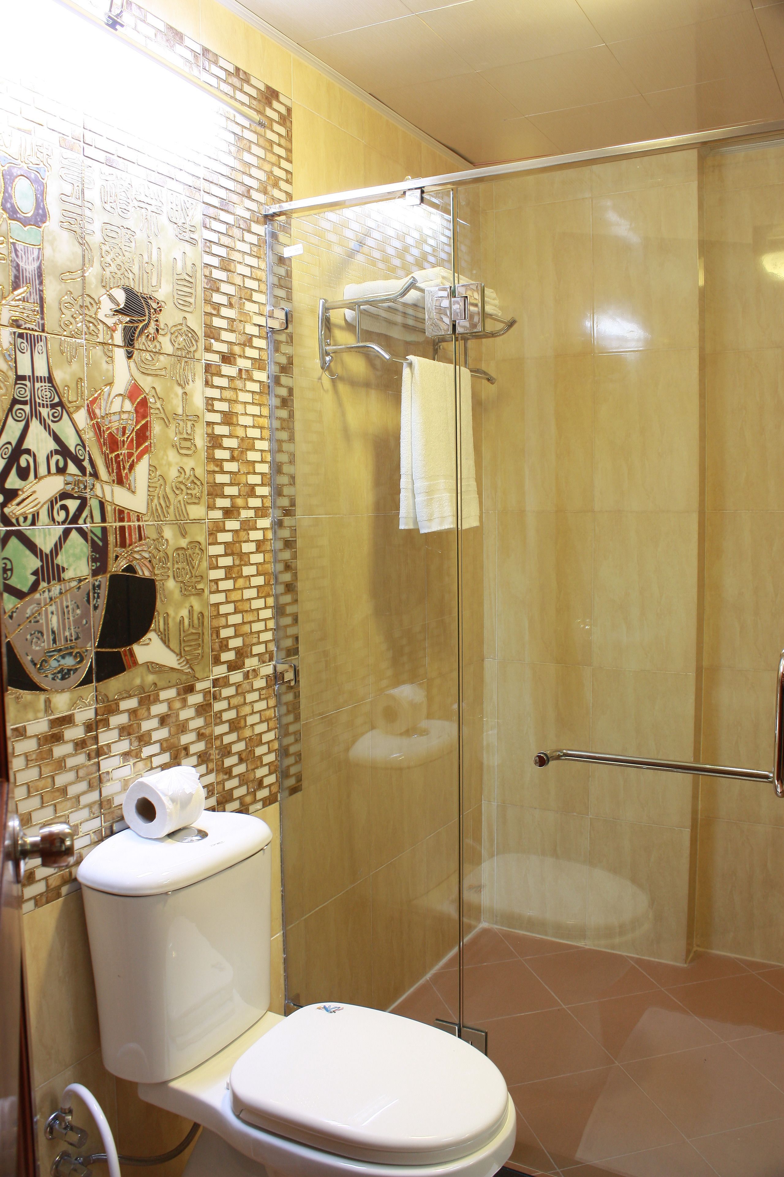 shower, free toiletries, slippers, towels