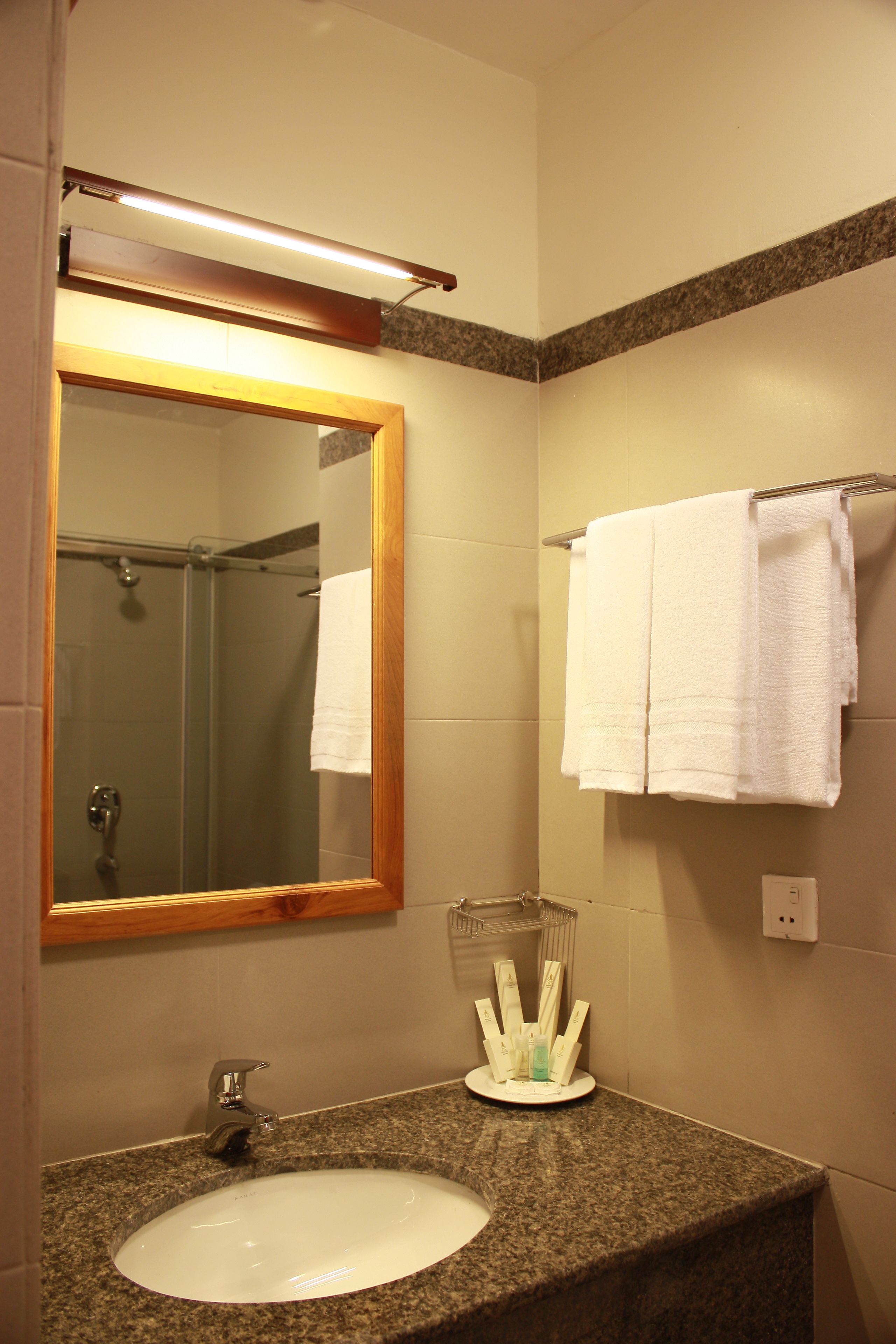 shower, free toiletries, slippers, towels