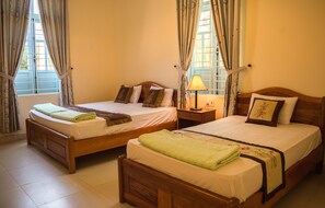 ห้องดีลักซ์, เตียงใหญ่ 2 เตียง, วิวสวน | มินิบาร์, โต๊ะทำงาน, เตียงเสริม/เปล, Wi-Fi ฟรี