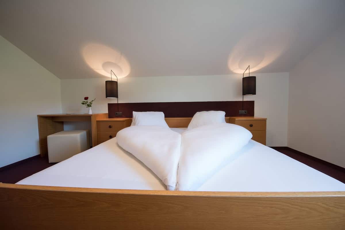 grand double room, 1 double bed with sofa bed | in-room safe, desk, bed sheets