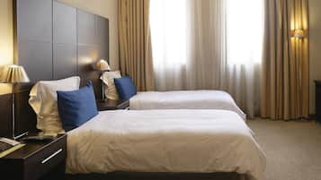 Ropa de cama de alta calidad y minibar