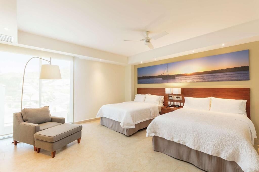 Premium bedding, down comforters, pillowtop beds, in-room safe