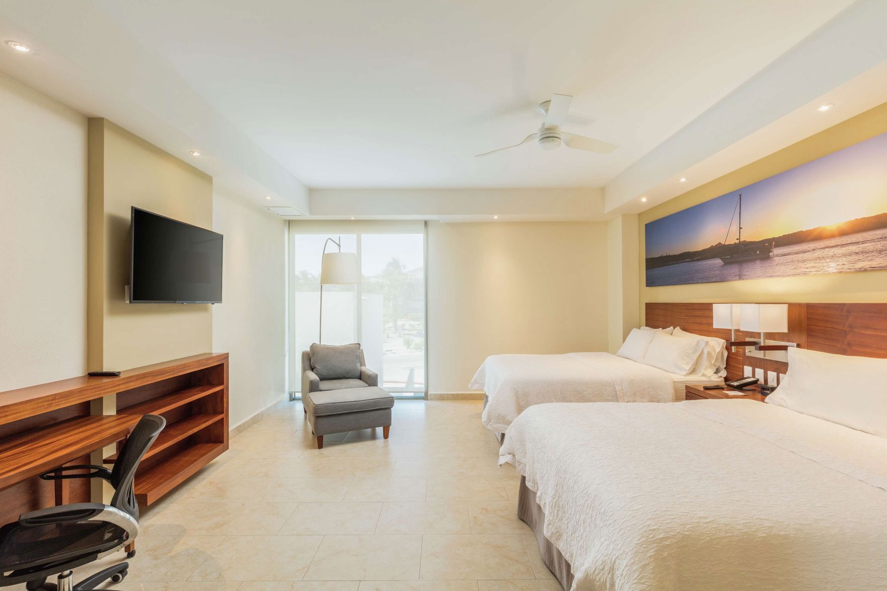 Premium bedding, down comforters, pillowtop beds, in-room safe