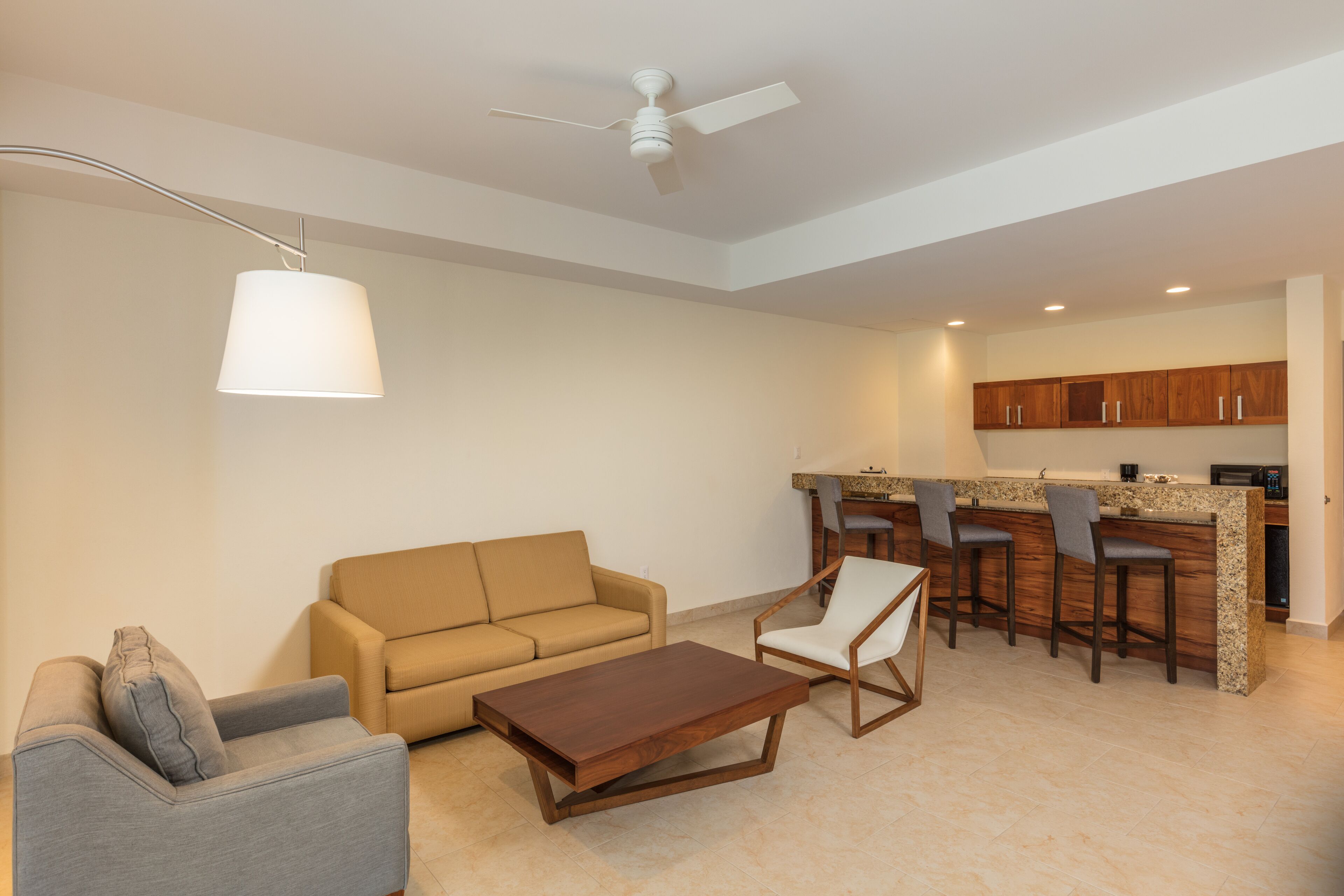 suite, 1 king bed, non smoking (wet bar) | living area | 42-inch flat-screen tv with cable channels, tv