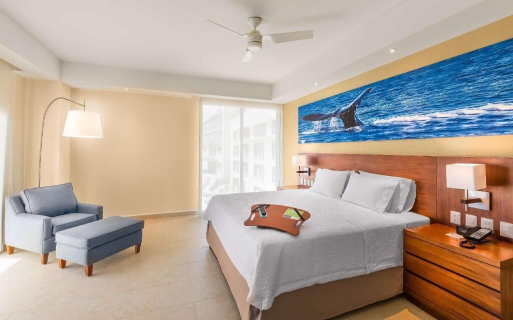 Premium bedding, down comforters, pillowtop beds, in-room safe