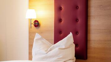 Premium bedding, in-room safe, desk, soundproofing