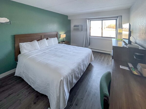 Quarto standard, 1 cama King | Wi-Fi de cortesia, roupa de cama