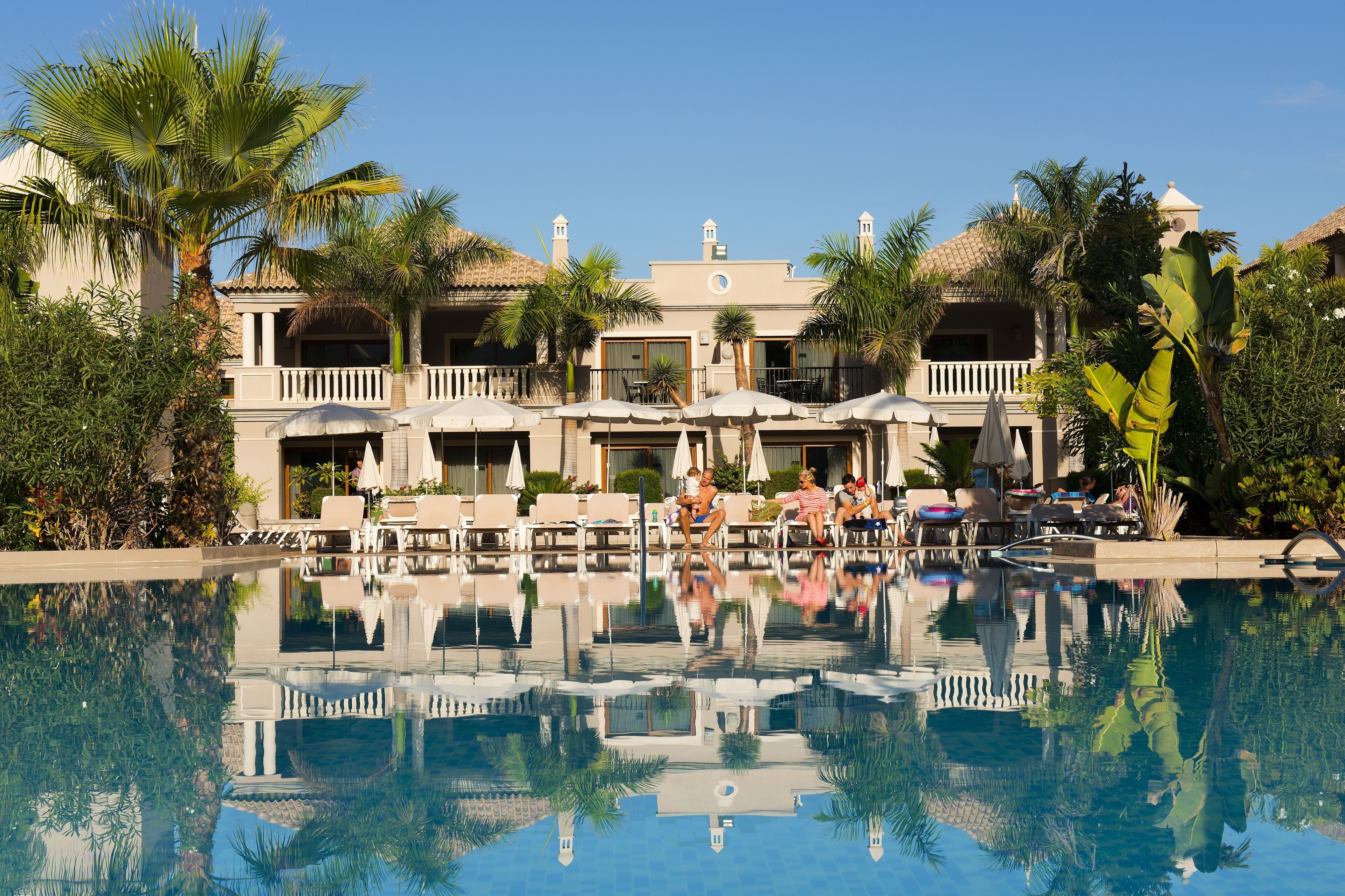 2 outdoor pools, pool umbrellas, pool loungers